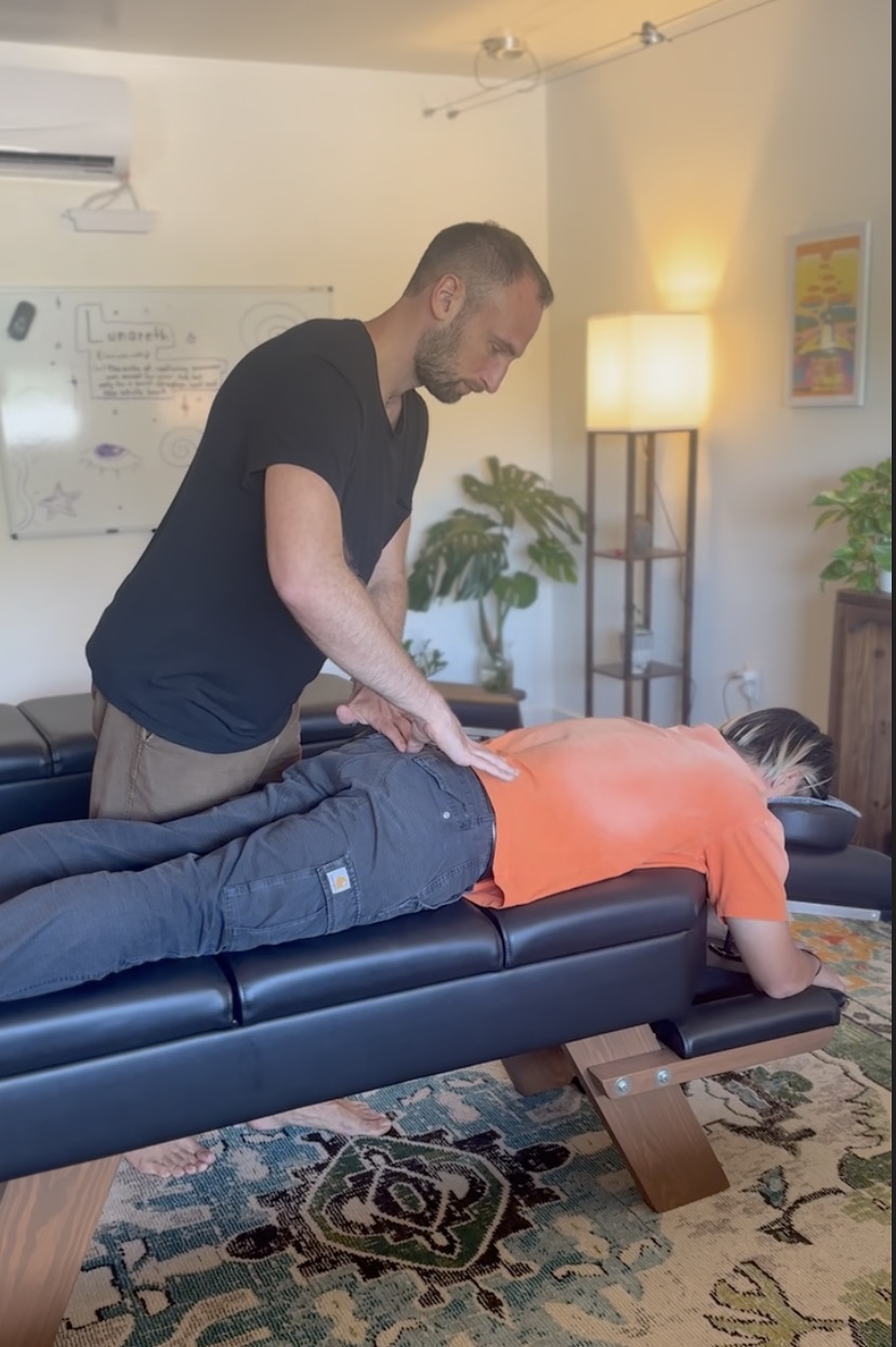 Dr. Ben providing a precise, gentle adjustment