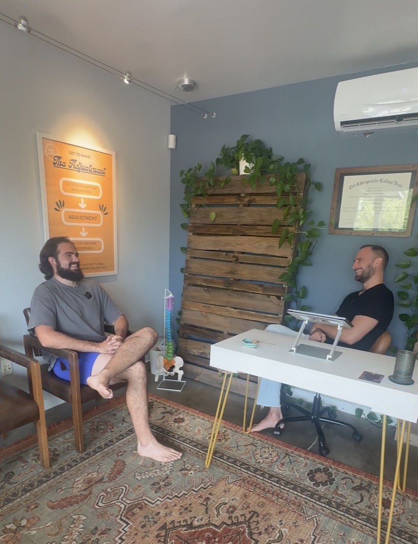Dr. Ben in conversation with a patient inside the practice